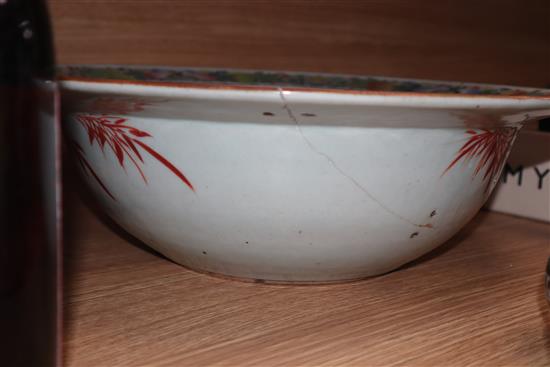 A 19th century Chinese famille rose basin, two jars and covers and a vase diameter 38cm